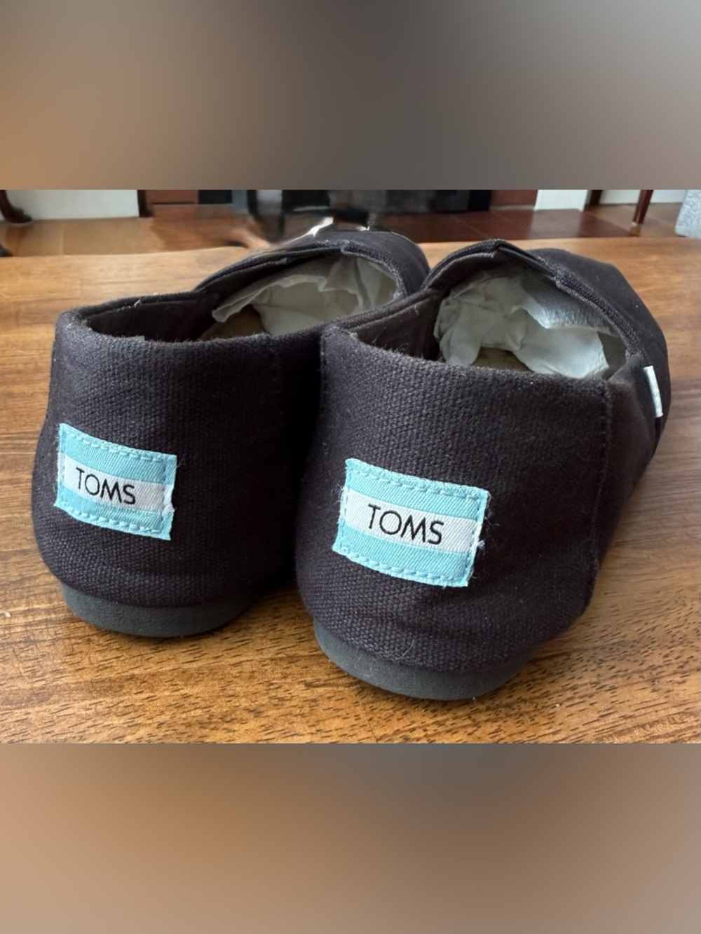 Toms Black Canvas Slip-On with Light Blue and White Logo Patch